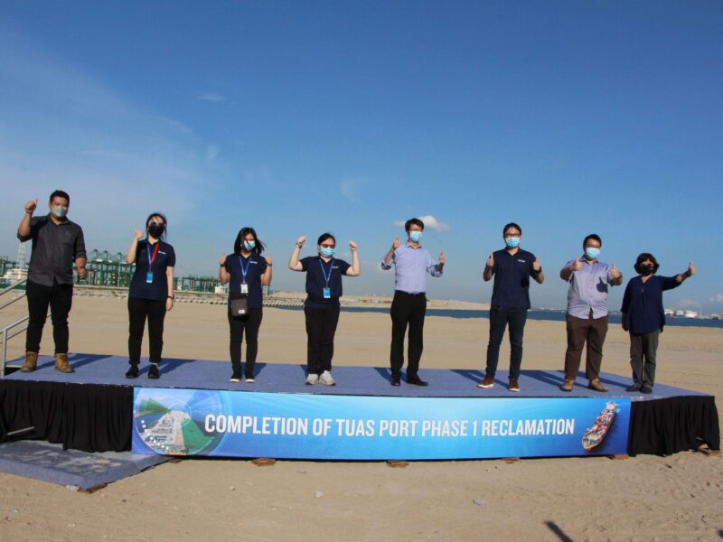 SJ Coastal Engineering team celebrating completion of Tuas Port Phase 1 Reclamation