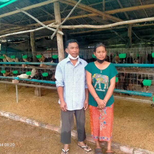 Chicken farmer and family in Cambodia
